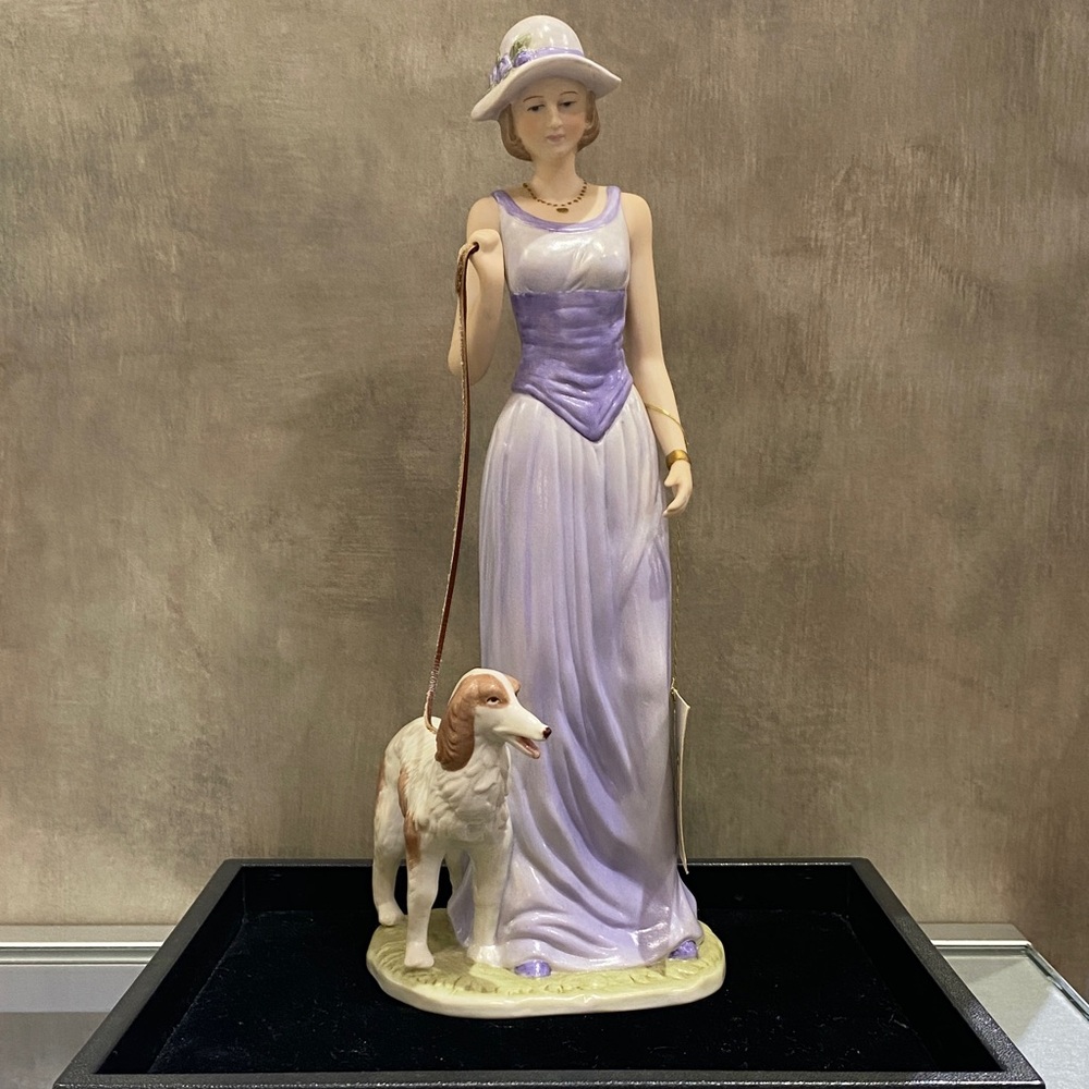 Claudia 10” Figurine of Elegant Lady walking her dog. SBL Regal House Collection